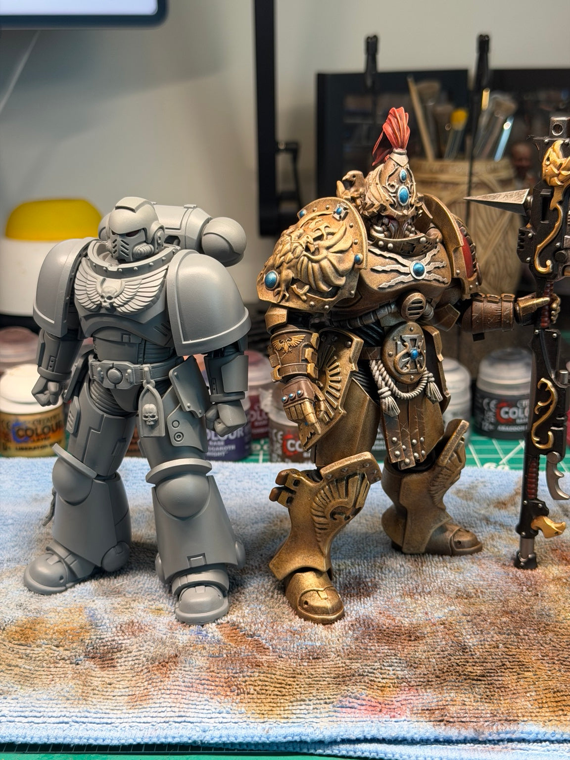 1/18 scale Armoring Hall Edition base figure beside painted Custodian conversion finished example
